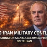 US Iran military conflict graphic showing Washington pressure on Tehran with US and Iran flags and Ryan Zinke during escalating tensions